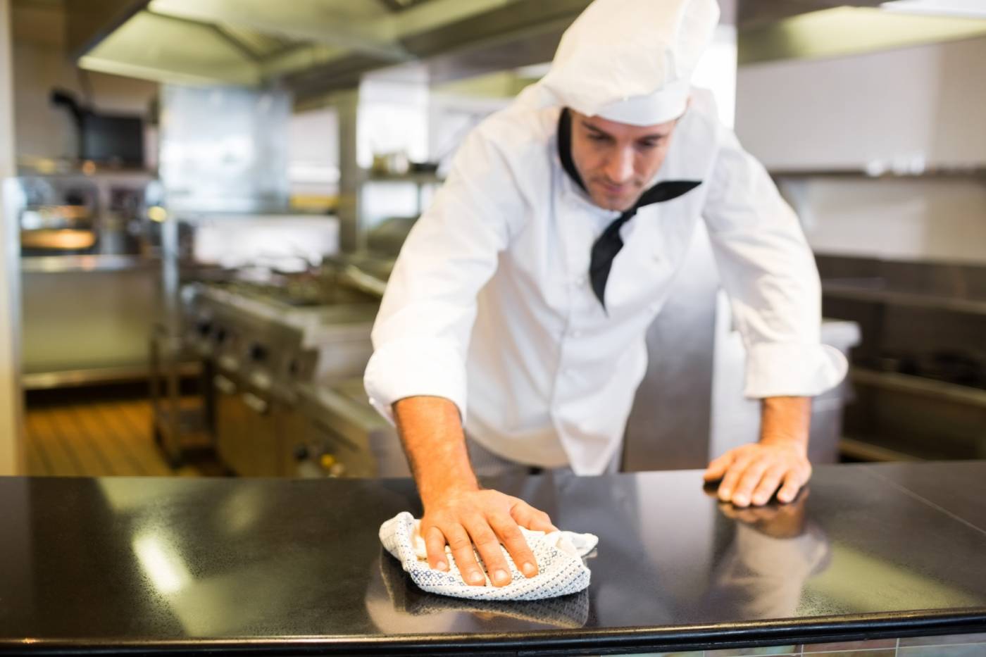 Chef Cleaning Kitchen